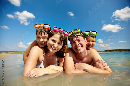 Photo: Sunbathers in water Sunbathers in water