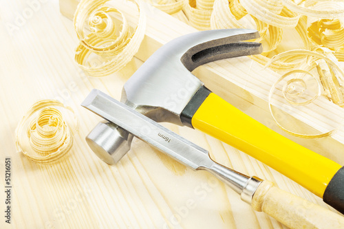 Photo: chisel with hammer on wood chisel with hammer on wood