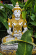 Sitting deva statue