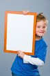 smiling boy with white tablet