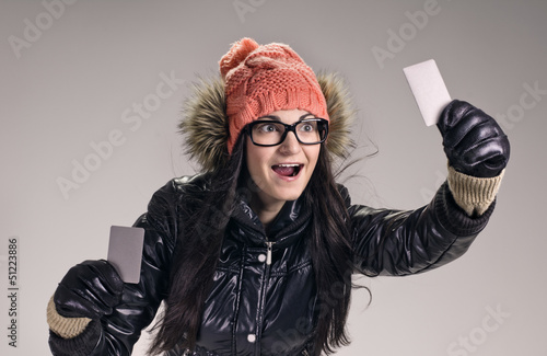 Photo: brunette with card brunette with card