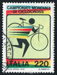 Bicyclist carrying bike