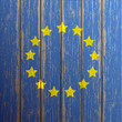 Euro flag painted on old wooden background