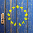 Euro flag painted on old wooden door