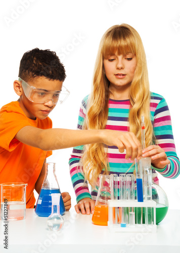 Photo: Couple kids in science lab Couple kids in science lab