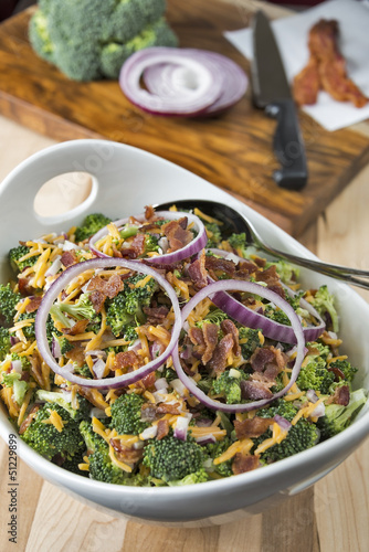 Photo: Bowl of broccoli salad with ingredients Bowl of broccoli salad with ingredients