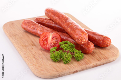 Photo: board with raw sausages board with raw sausages