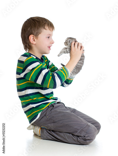 Photo: kid boy with kitten isolated on white background kid boy with kitten isolated on white background