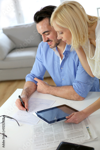 Photo: Middle-aged couple working from home Middle-aged couple working from home