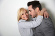 Trendy loving couple on white background
