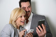 Couple using smartphone together