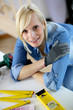 Woman doing home improvement
