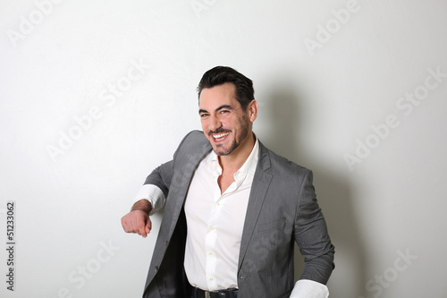 Photo: Middle-aged man standing on white background Middle-aged man standing on white background