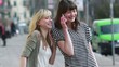 Happy girls with mobile phones