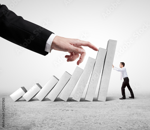 Photo: man holding column man holding column