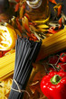 Detaily fotografie Pasta ingredients on black table