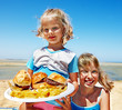 Child eating fast food.