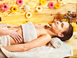 Foto: Woman getting massage . Woman getting massage .