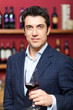 Sommelier tasting red wine