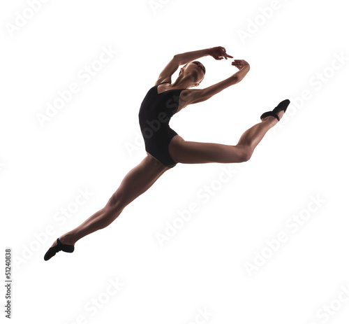 Photo: young modern ballet dancer jumping young modern ballet dancer jumping