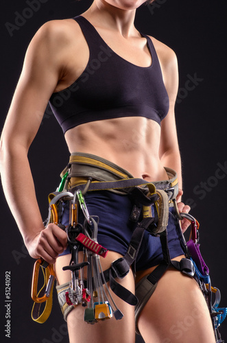 Photo: female body in climbing equipment female body in climbing equipment