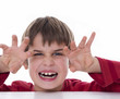 Photo: Young boy wants to scare someone Young boy wants to scare someone