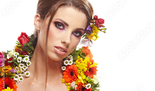 Photo: Woman with hairstyle and flower. Isolated. Woman with hairstyle and flower. Isolated.