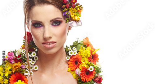 Photo: Woman with hairstyle and flower. Isolated. Woman with hairstyle and flower. Isolated.