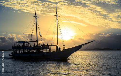 Photo: Boat sailing at sunset Boat sailing at sunset