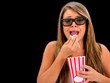 Scared woman watching 3D movie