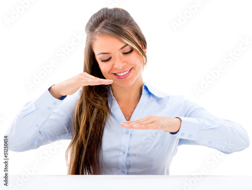 Photo: Business woman displaying something Business woman displaying something