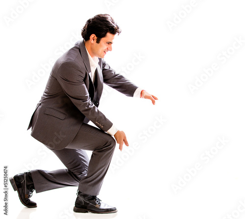 Photo: Business man holding something Business man holding something