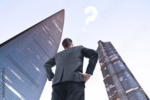 Photo: man looking on city man looking on city