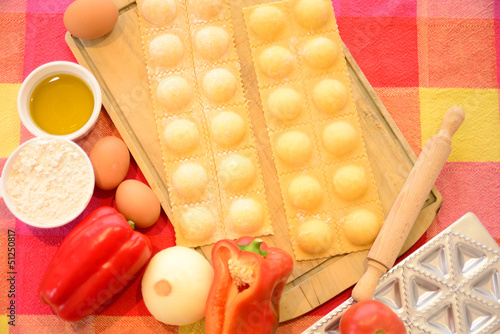 Photo: Homemade raviolis with ingredients. Homemade raviolis with ingredients.