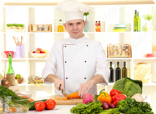 Photo: Chef cooking in kitchen Chef cooking in kitchen
