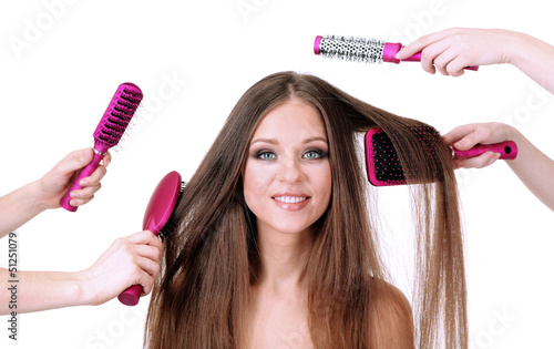 Photo: Woman with long hair in beauty salon, isolated on white Woman with long hair in beauty salon, isolated on white