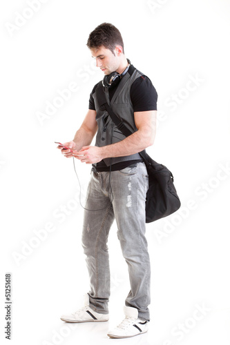 Photo: Full length portrait school boy phone isolated Full length portrait school boy phone isolated