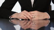 Putting on wedding ring.
