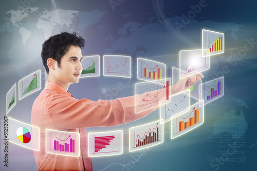 Photo: Businessman choose graph on touchscreen Businessman choose graph on touchscreen