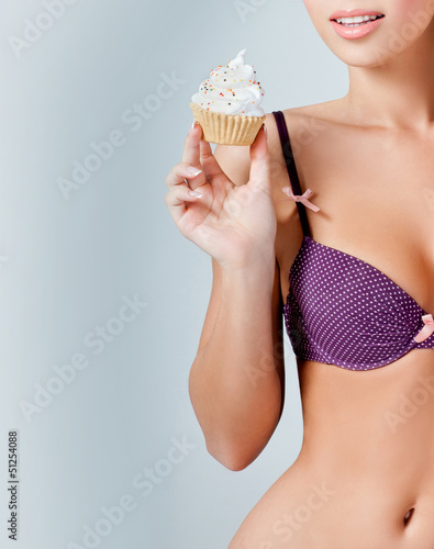 Photo: beautiful girl eats cake beautiful girl eats cake