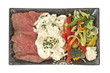 Roast beef with potato salad and vegetables