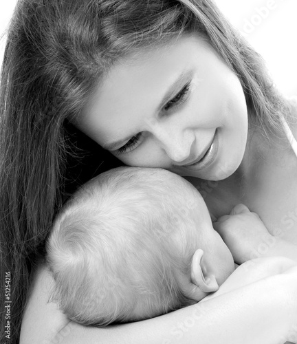 Photo: Mother breast feeding her infant Mother breast feeding her infant