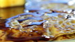 Appetizing fried pancake rotates  close-up