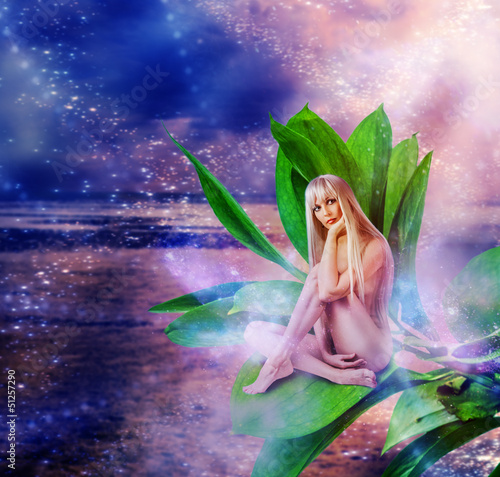 Photo: Beautiful sexy woman pixie on leaves Beautiful sexy woman pixie on leaves