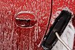 Cleaning the car at jetwash