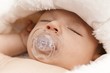 Photo: Closeup sleeping adorable baby face Closeup sleeping adorable baby face
