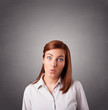 Young woman standing and thinking with copy space