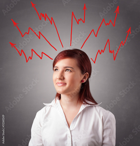 Photo: Young woman thinking with arrows overhead Young woman thinking with arrows overhead