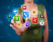 Woman pressing various collection of high tech buttons