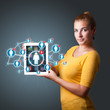 young woman holding tablet with social network icons